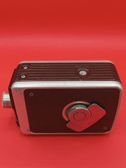 Vintage Kodak Brownie 8MM video camera featuring a Cine-Ektanon lens in leather