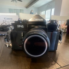 Canon F-1 Black SLR Film Camera with Lens, Strap, and Case