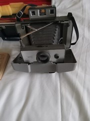 Vintage polaroid 320 land camera with hard case plus flash attachment