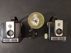 TWO VINTAGE KODAK BROWNIE HAWKEYE FLASH CAMERAS. One Flash Attachment. Untested