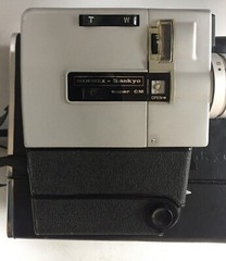 Vintage SANKYO Super CM 300 with original case.
