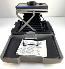 Polaroid 210 Land Camera – Accessories Included (Manual, Strap, and Some Film)