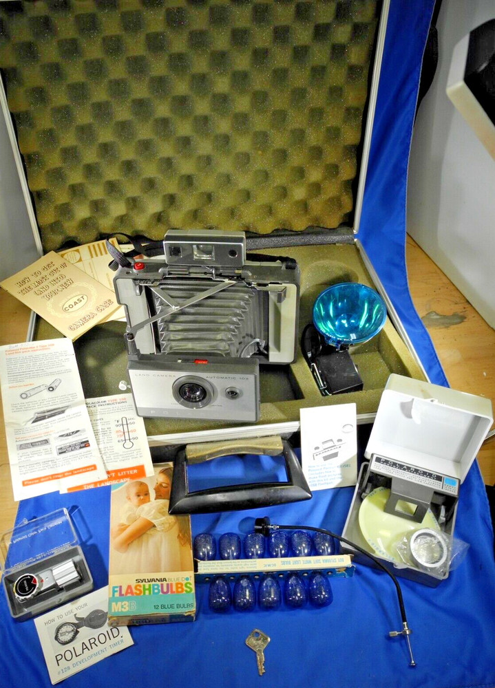 Polaroid automatic 103 land camera w/ flash & many accessories & New Battery!