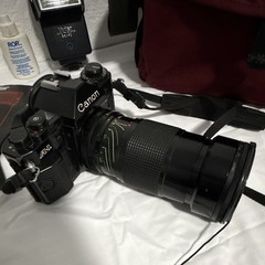 Canon A-1 35mm SLR Film Camera Black w/ Vivitar Series 1 Zoom Lens
