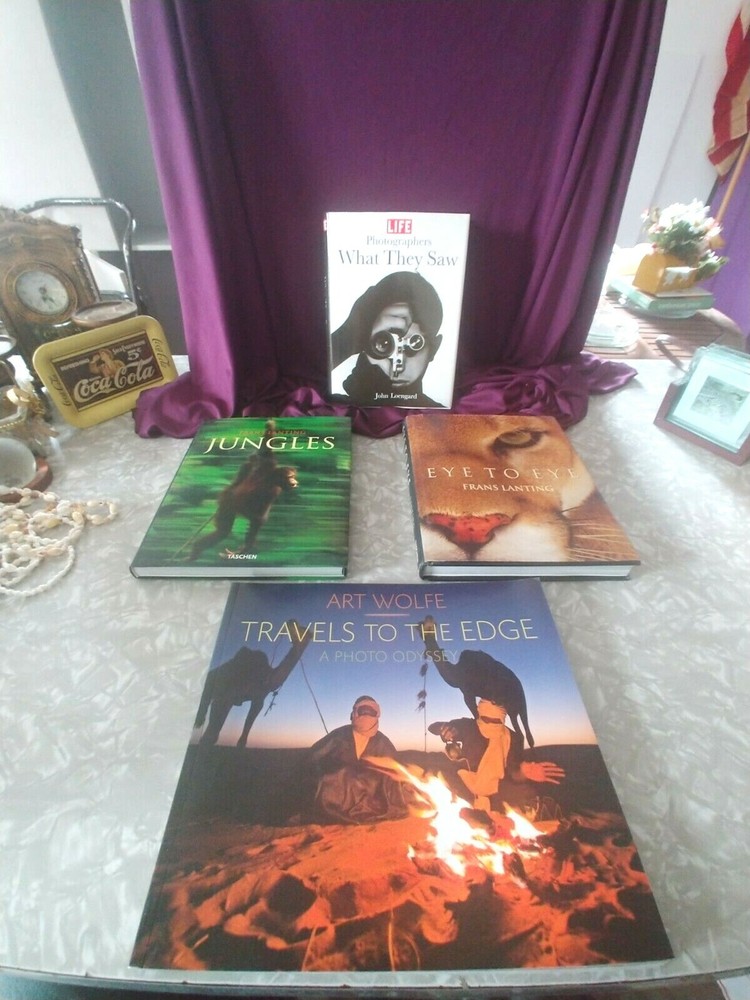 PHOTOGRAPHERS BKS LIFE BY JOHN LOENGERD, JUNGLES BY FRANS LANTING EYE TO EYE