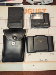 Minox 35 Pl And A Minox Fc 35 St And Two Protective Cases