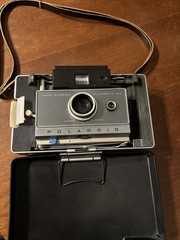 Vintage Polaroid Land Camera Automatic 100. Mint Condition W/ Leather Strap