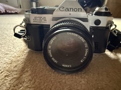 Canon AE-1 Program Silver 35mm SLR Film Camera w/ FD 50mm f/1.8 Lens