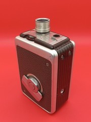 Vintage Kodak Brownie 8MM video camera featuring a Cine-Ektanon lens in leather