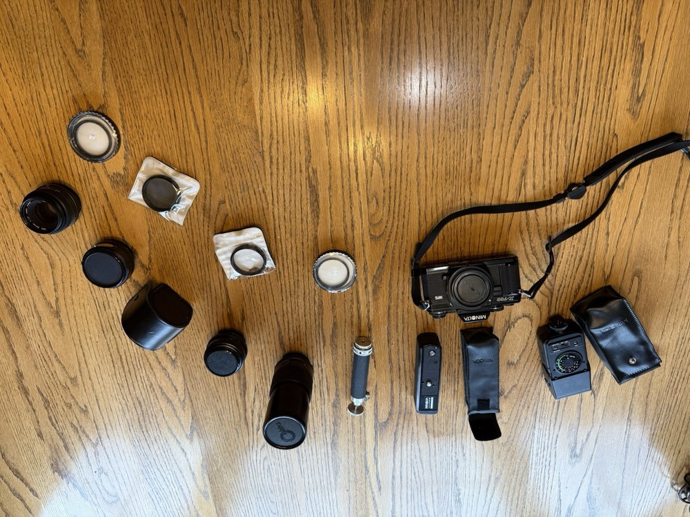 Minolta X-700 Black 35mm SLR film camera kit with lenses, light meter & cases