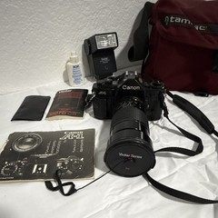 Canon A-1 35mm SLR Film Camera Black w/ Vivitar Series 1 Zoom Lens