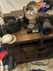 Multiple Vintage Cameras With accessories