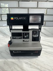 Polaroid Sun 600 LMS Vintage Instant Film Camera, Black Color Model Untested