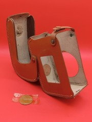 Vintage Kodak Brownie 8MM video camera featuring a Cine-Ektanon lens in leather
