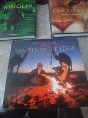 PHOTOGRAPHERS BKS LIFE BY JOHN LOENGERD, JUNGLES BY FRANS LANTING EYE TO EYE