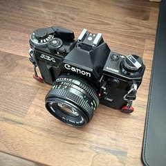 Canon AE-1 35mm Film SLR Camera Black Body with Lens (Black)