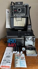Vtg Polaroid 440 Automatic Land Folding Camera w/ Case Manual Flash Filter Set