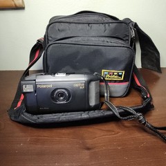 Vintage Profoto brand camera bag And Polaroid Captiva SLR instant film camera