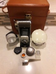 Polaroid Land Camera Model 80A, with case, wink-light, diffuser set, filter,etc