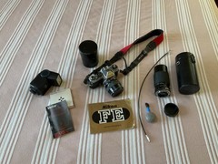 Nikon FE Black Vintage 35mm SLR Film Camera Bundle with lenses and flash