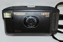 POLAROID CAPTIVA SLR AUTO FOCUS, F12/107MM, WITH ORIGINAL CASE