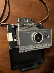 Vintage Polaroid Land Camera Automatic 100. Mint Condition W/ Leather Strap